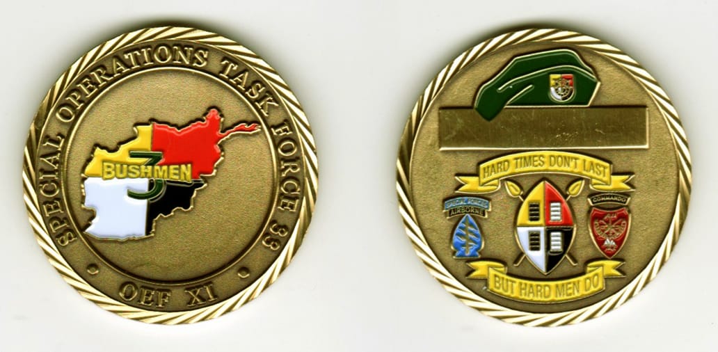 Round shaped, brass colored coin, 1 11/16 inches in diameter.