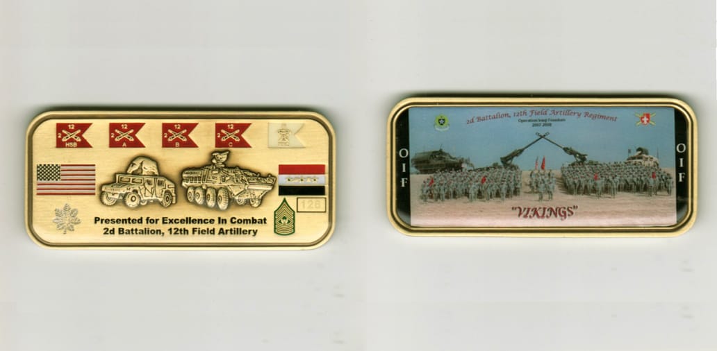 Retangular shaped, brass colored coin, 1 1/4 inches high x 3 inches wide.