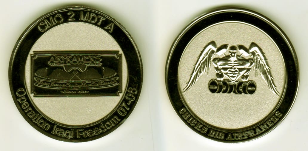 Round shaped,silver colored coin, 2  inches in diameter.