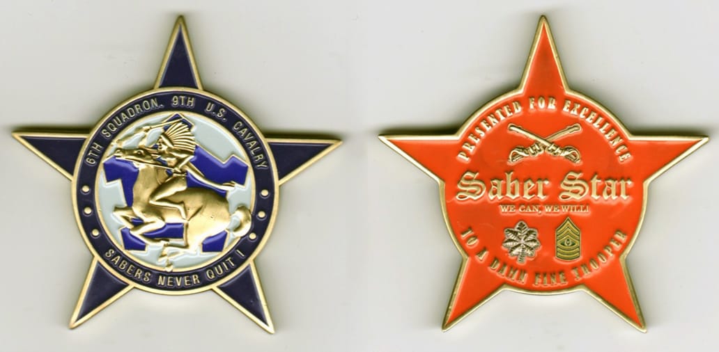 Star shaped with a circular center, gold colored coin, 2 3/4 inches high x 2 3/4 inches wide.