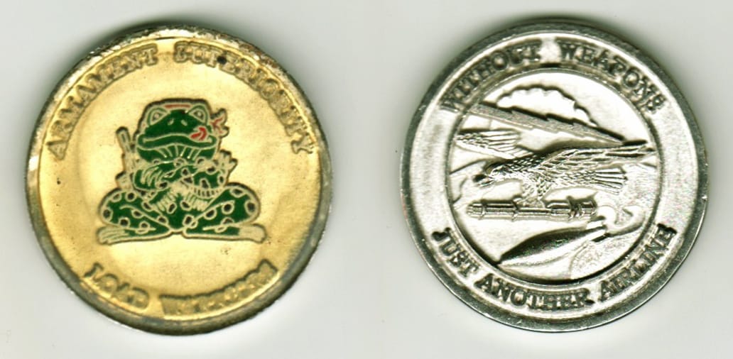 Round shaped, gold colored front & silver colored backed coin, 1 3/8  inches in diameter.