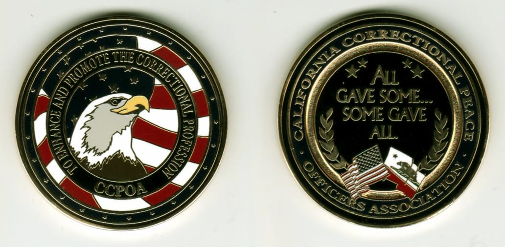 Round shaped, gold colored coin, 1 1/4  inches in diameter.