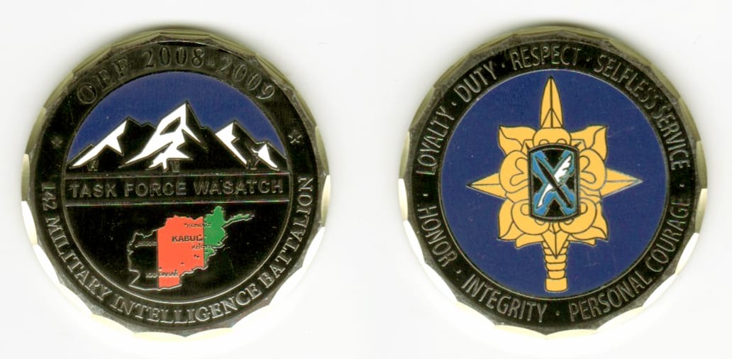 Round shaped, gold colored coin, 1 1/2  inches in diameter.