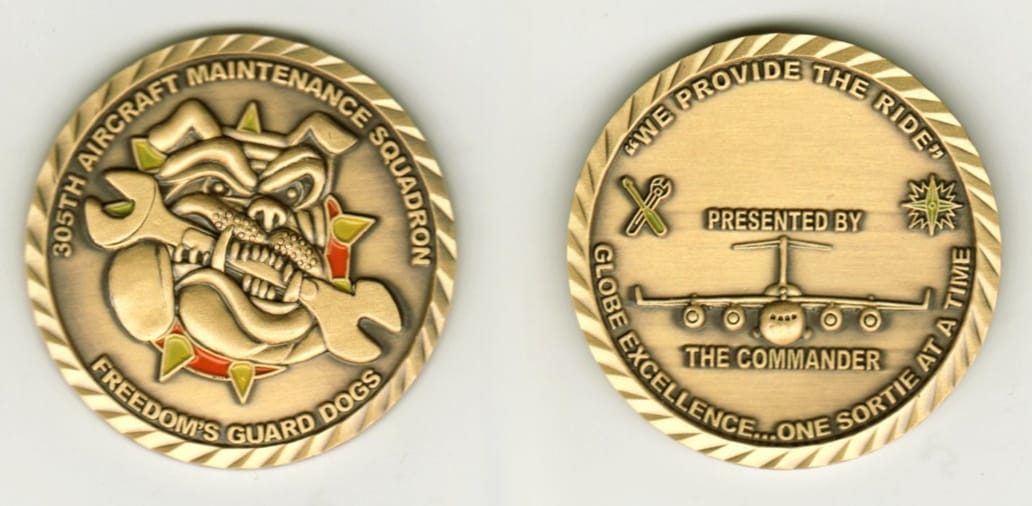 Round shaped, gold colored coin, 1 1/2  inches in diameter.