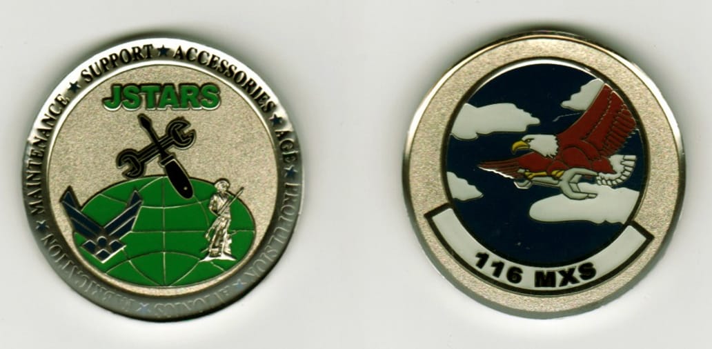 Round shaped, silver colored coin, 1 3/8  inches in diameter.