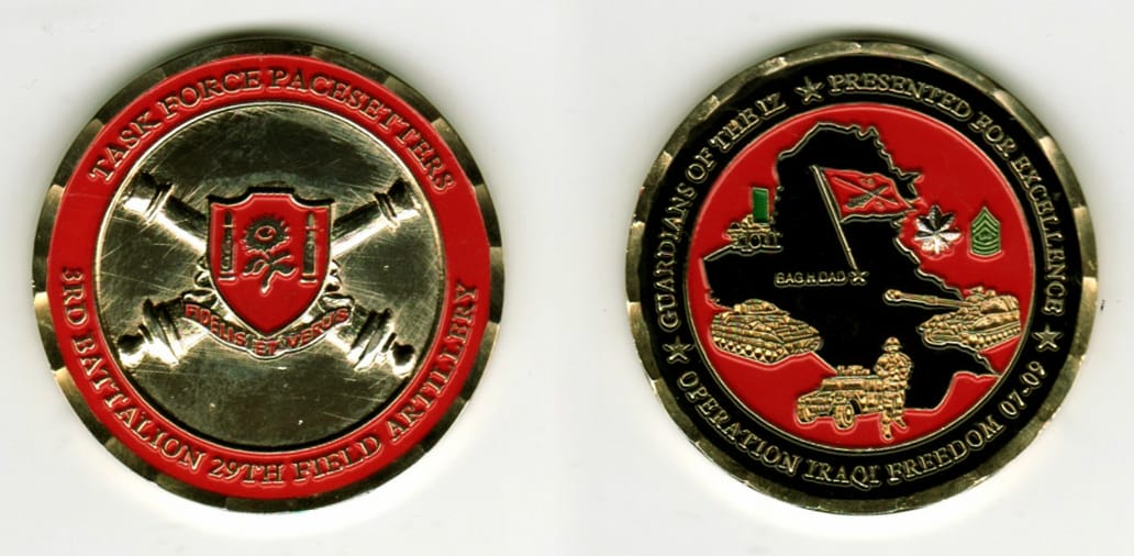 Round shaped, gold colored coin, 1 11/16  inches in diameter.