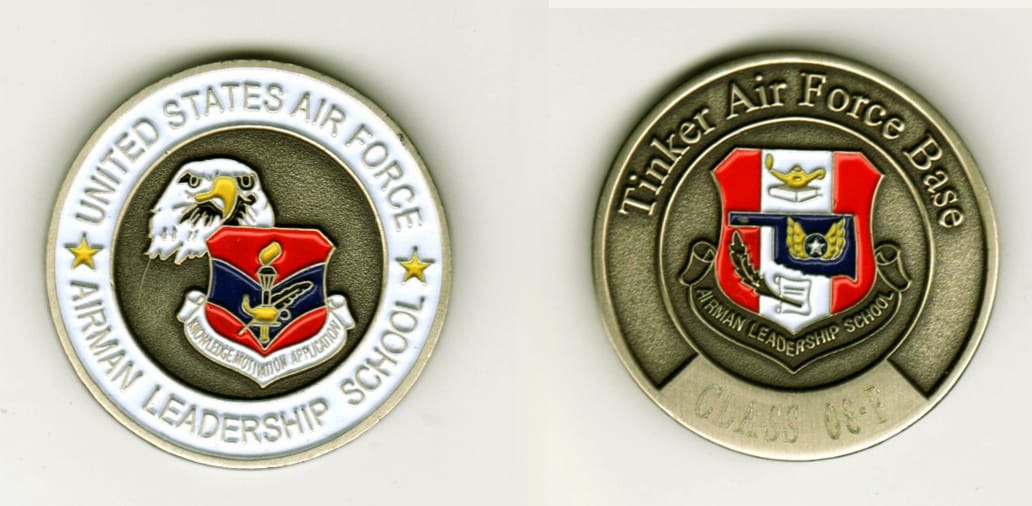 Round shaped, brass colored coin, 1 3/8  inches in diameter.