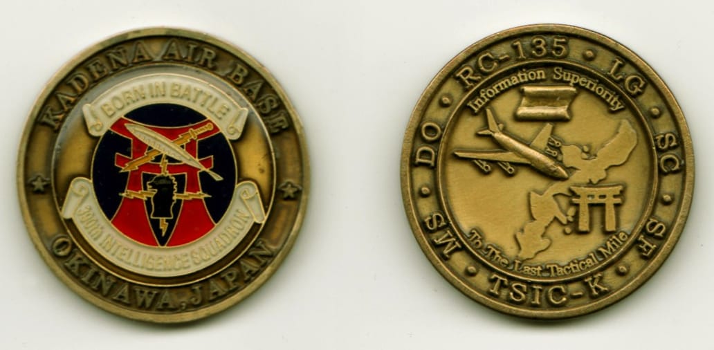 Round shaped, brass colored coin, 1 1/2  inches in diameter.