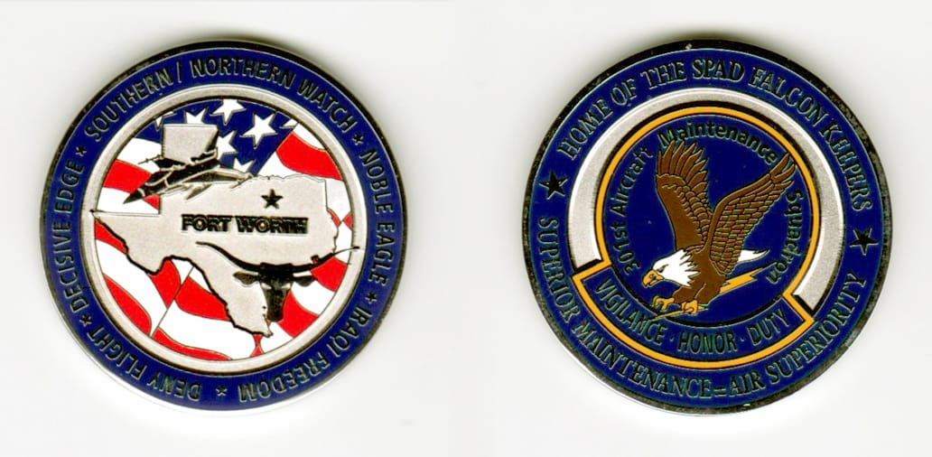 Round shaped, silver colored coin, 1 11/16  inches in diameter.