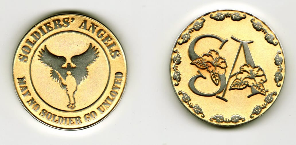 Round shaped, gold colored coin, 1 1/2  inches in diameter.