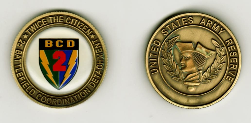 Round shaped, brass colored coin, 1 1/2  inches in diameter.