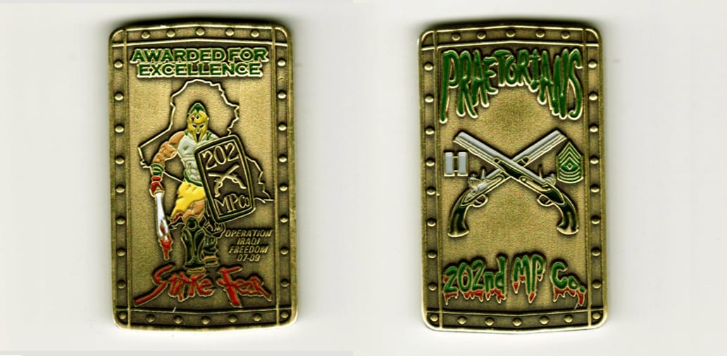 Retangular shaped, brass colored coin, 1 inches x 2 inches high.