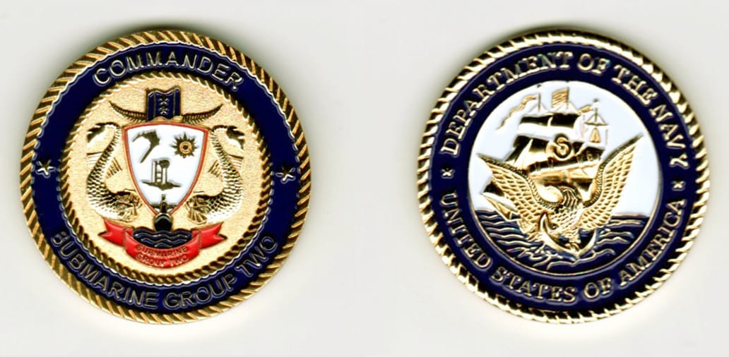 Round shaped, gold colored coin, 1 1/2  inches in diameter.