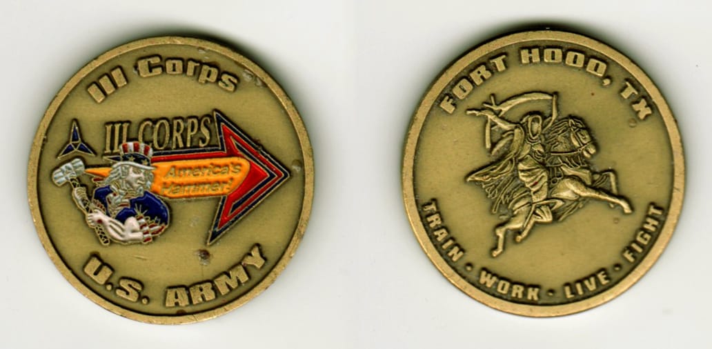 Round shaped, brass colored coin, 1 9/16  inches in diameter.