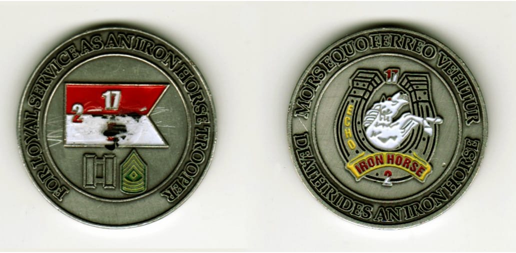 Round shaped, pewter colored coin, 1 1/2  inches in diameter.