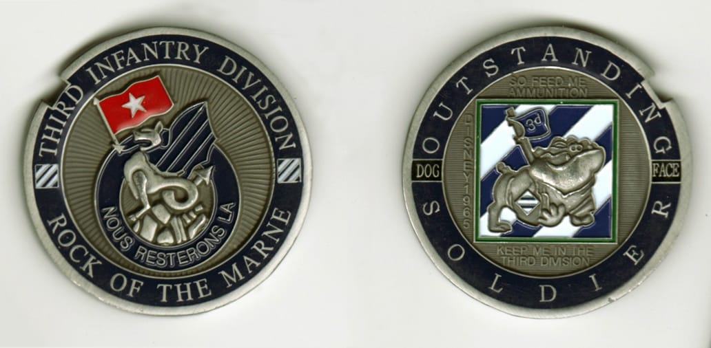 Round shaped, pewter colored coin, 2 1/8  inches in diameter.