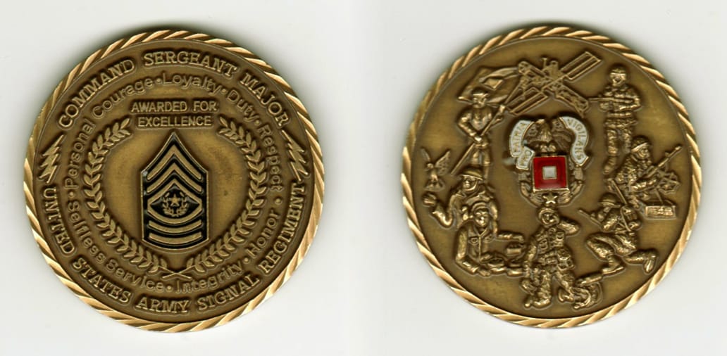 Round shaped, brass colored coin, 2 inches in diameter.