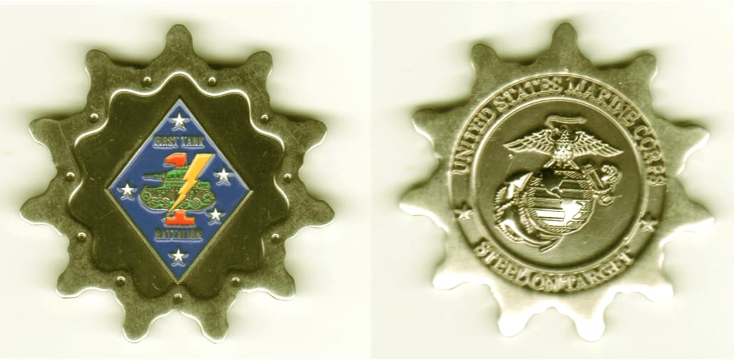 Cog shaped, silver colored coin, 2  inches in diameter.