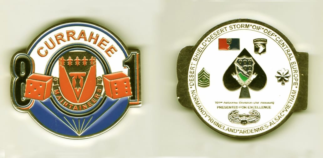 Round shaped, gold colored coin with the numbers 8 and 1 slightly protuding from sides, 2  inches wide x 1 1/2 inches hi...