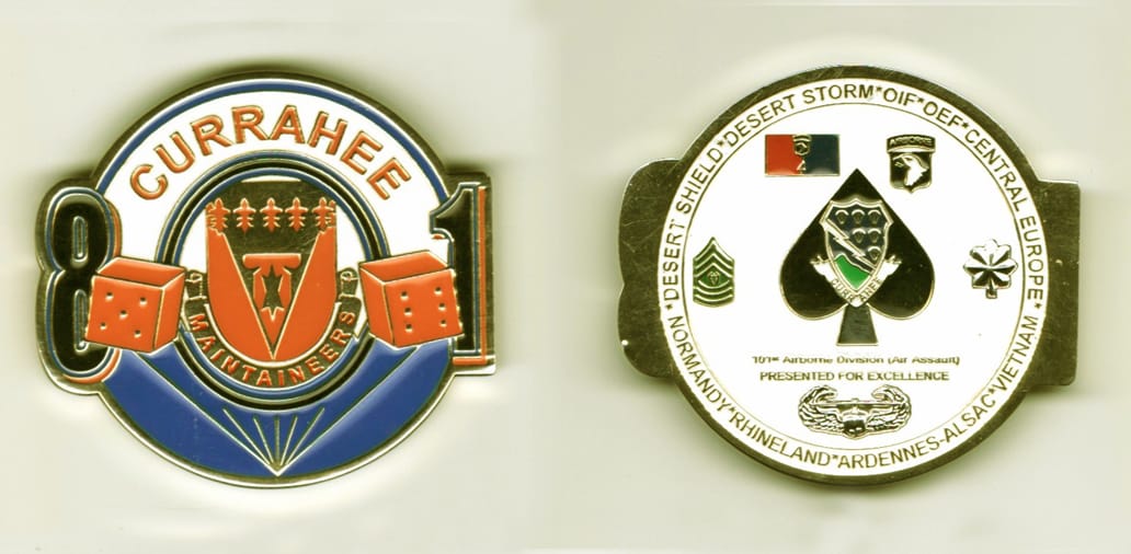 Round shaped, gold colored coin with the numbers 8 and 1 slightly protuding from sides, 2  inches wide x 1 1/2 inches hi...