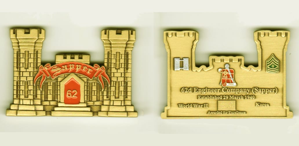 Engineer Castle shaped, gold colored coin, 2 1/4 inches wide x 1 1/2  inches high.