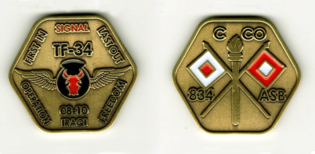 Hexagon shaped, brass colored coin, 1 7/8 inches in diameter.