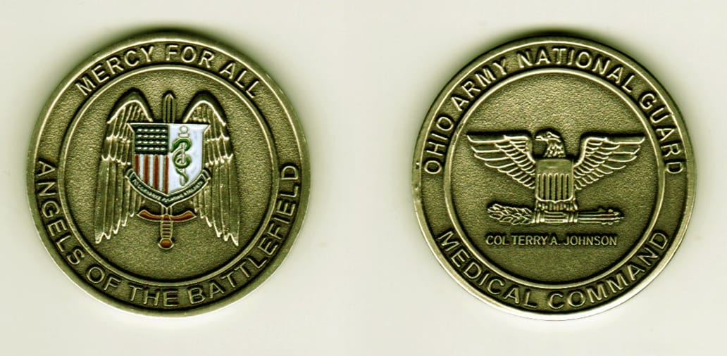 Round shaped, brass colored coin, 1 1/2  inches in diameter.