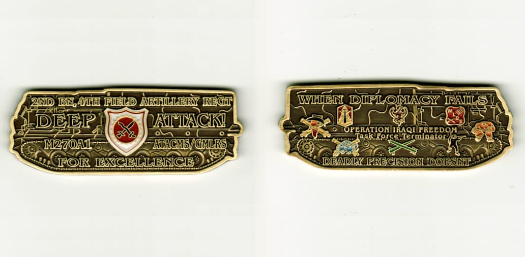 Vehicle shaped, brass colored coin, 2 1/2 inches wide x 1 inch high.