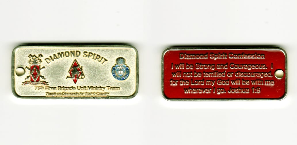 Retangular shaped, gold colored coin, 2  inches wide x 1 inch high.