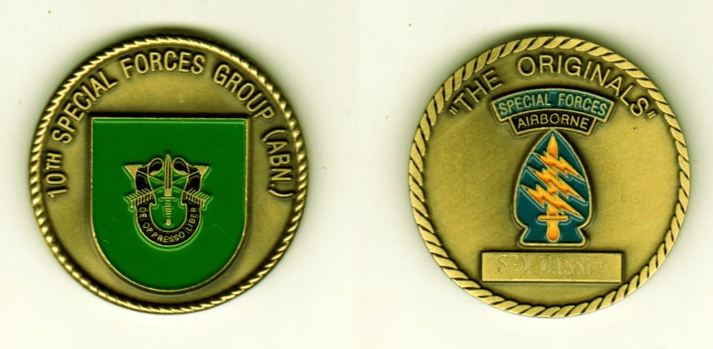 Round shaped, brass colored coin, 1 1/4  inches in diameter.