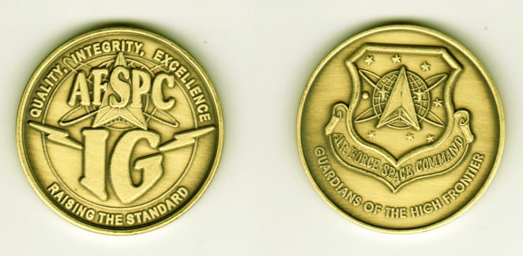 Round shaped, brass colored coin, 1 1/2  inches in diameter.