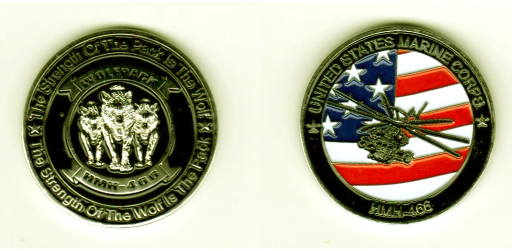 Round shaped, silver colored coin, 1 3/8  inches in diameter.