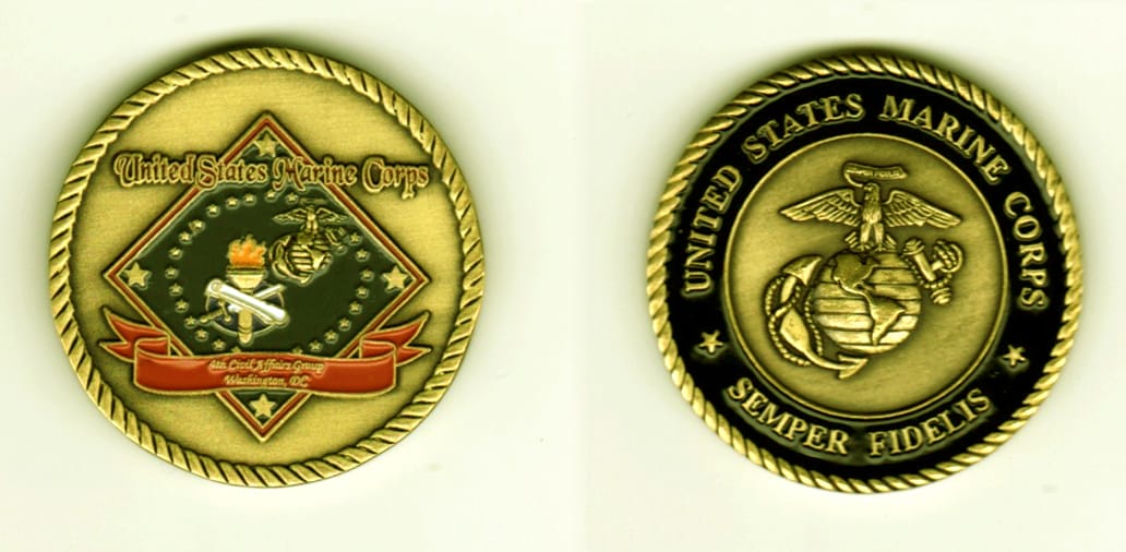 Round shaped, brass colored coin, 1 1/2  inches in diameter.