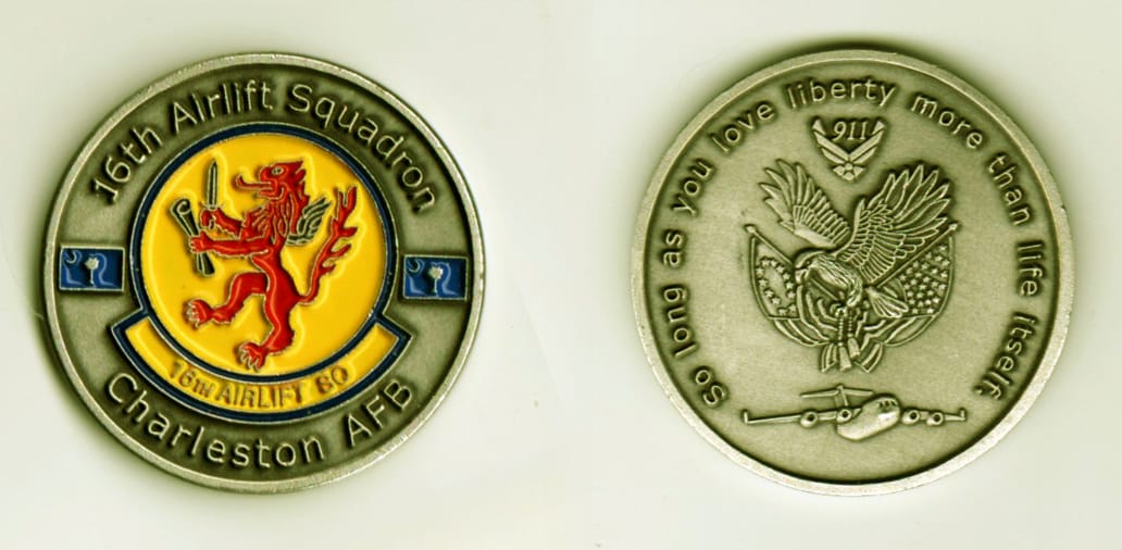 Round shaped, silver colored coin, 1 3/8  inches in diameter.