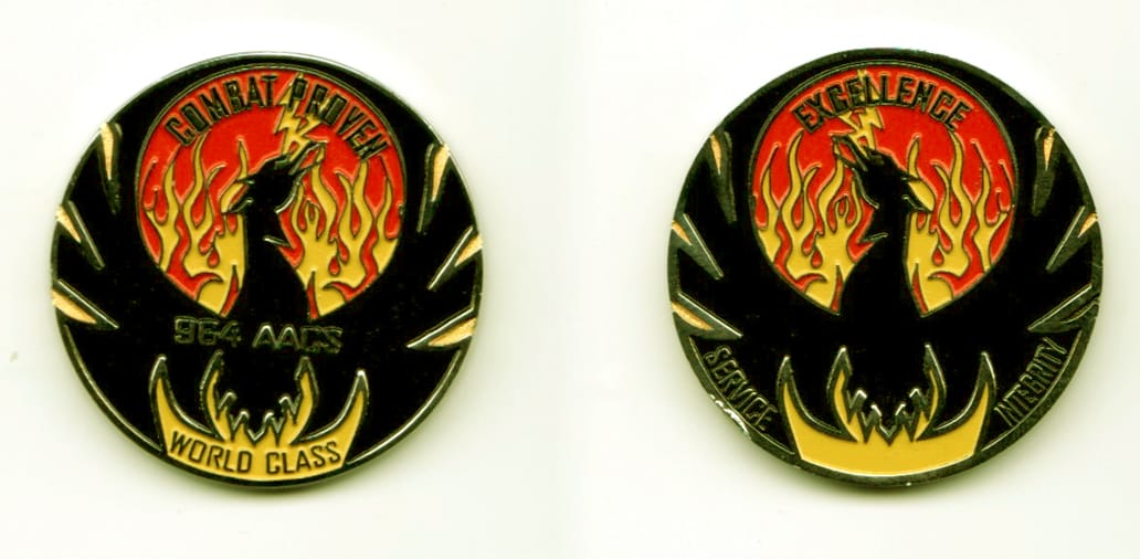 Round shaped, silver colored coin, 1 3/8  inches in diameter.