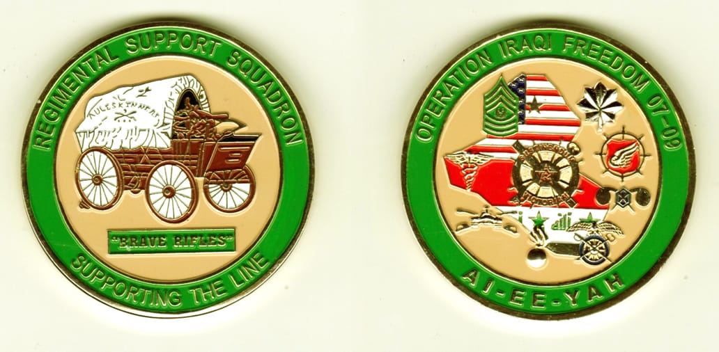 Round shaped, gold colored coin, 1 13/16  inches in diameter.