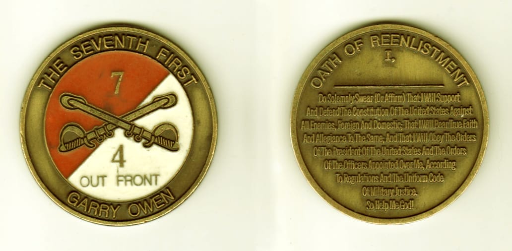 Round shaped, brass colored coin, 1 13/16  inches in diameter.