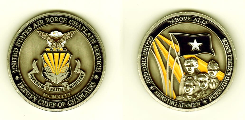 Round shaped, pewter colored coin, 2  inches in diameter.