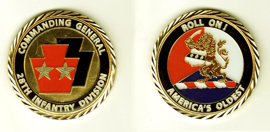 Round shaped, gold colored coin, 2 1/8  inches in diameter.