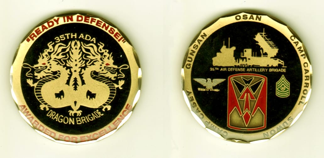 Round shaped, gold colored coin, 2  inches in diameter.