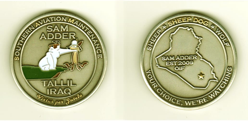 Round shaped, silver colored coin, 2  inches in diameter.