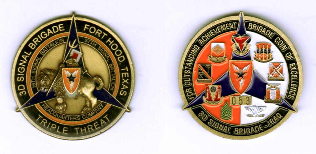 Round shaped, brass colored coin, 2 inches in diameter.