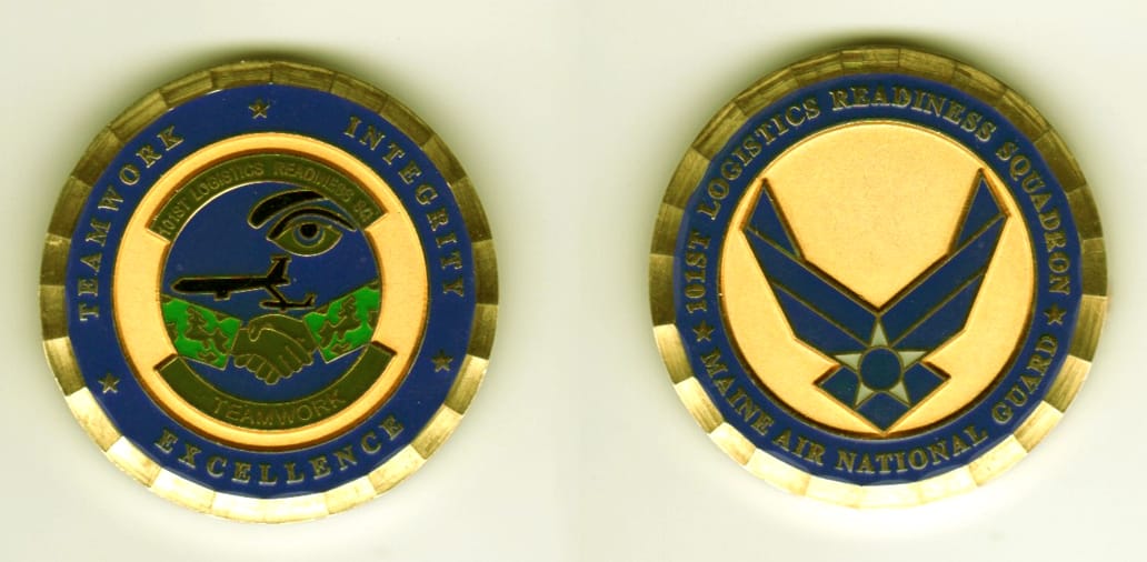 Round shaped, brass colored coin, 1 11/16  inches in diameter.