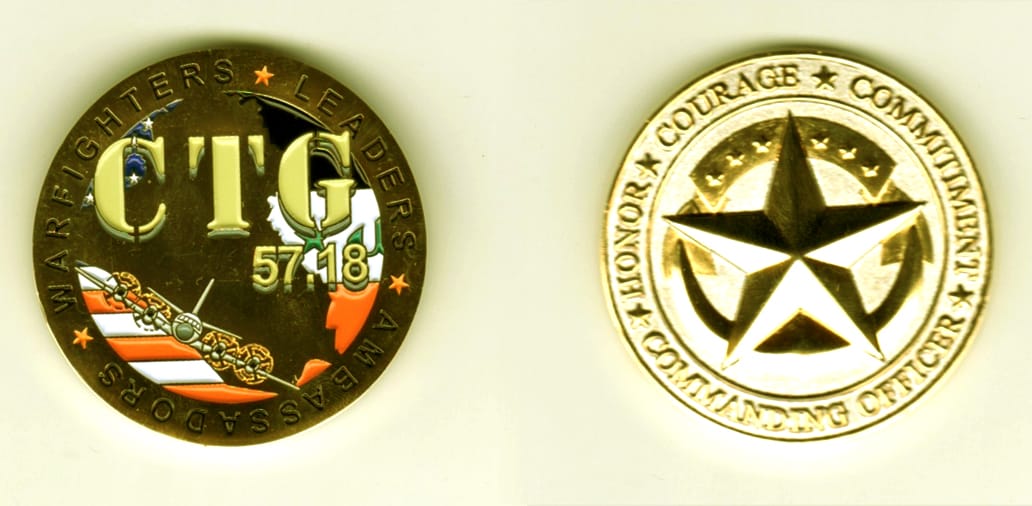 Round shaped, gold colored coin, 1 11/16  inches in diameter.