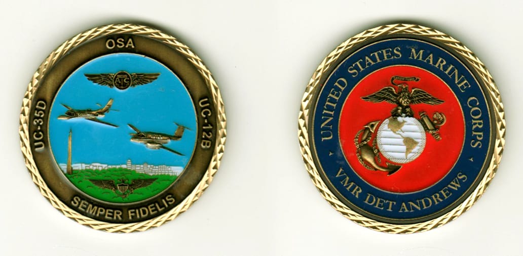 Round shaped, brass colored coin, 1 11/16  inches in diameter.