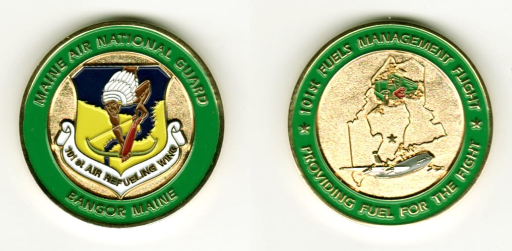 Round shaped, brass colored coin, 1 1/2  inches in diameter.