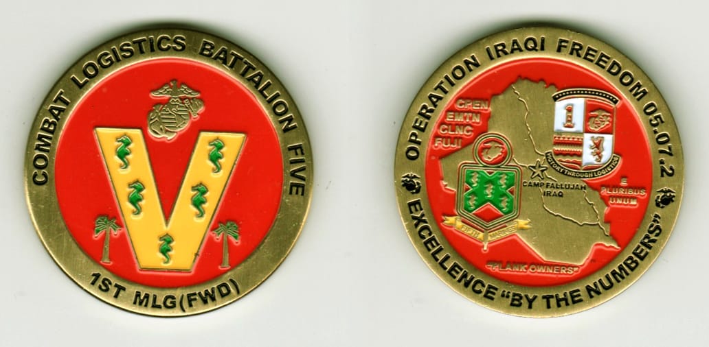 Round shaped, brass colored coin, 1 11/16  inches in diameter.