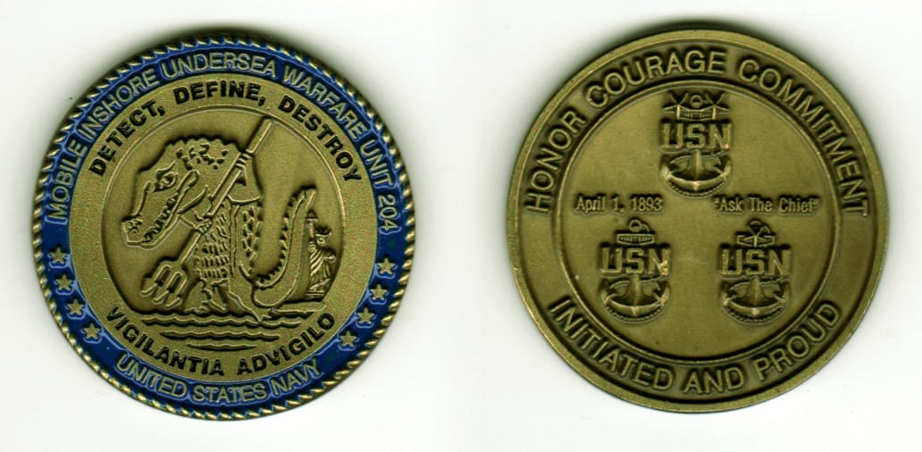 Round shaped, antique brass colored coin, 1 11/16  inches in diameter.