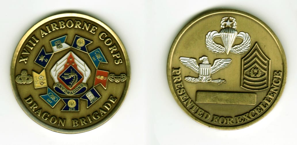 Round shaped, antique brass colored coin, 1 11/16  inches in diameter.