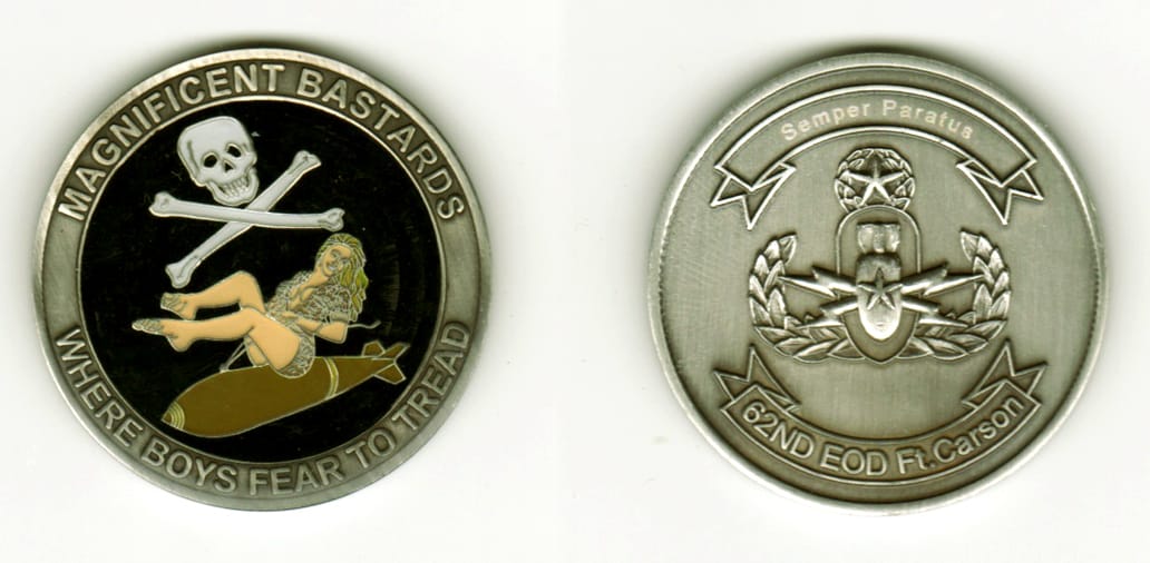 Round shaped,brussed silver colored coin, 1 11/16  inches in diameter.